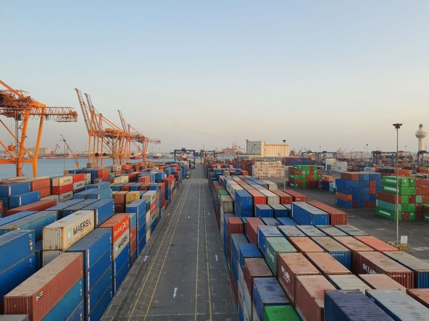 Export shipping containers staged at port for onward freight